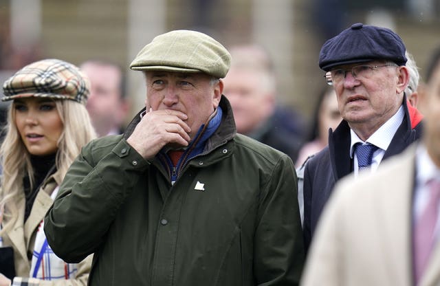 Paul Nicholls and Sir Alex Ferguson watch the action at Cheltenham last year 