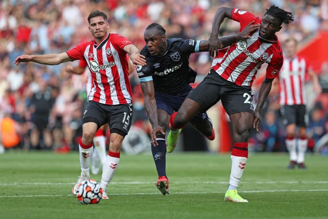 Michail Antonio, centre, battles for possession with Mohammed Salisu, right, and Romain Perraud