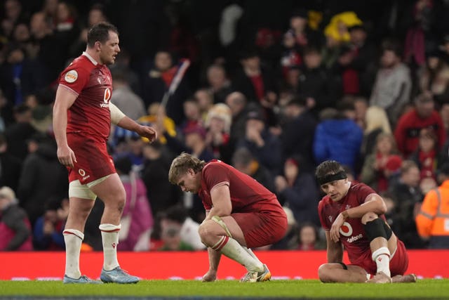 Wales players appear dejected after the final whistle
