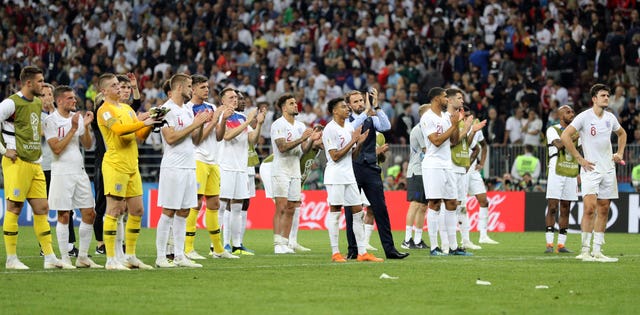 England manager Gareth Southgate and players applaud fans after losing against Croatia during the 2018 World Cup semi-final in Moscow (Owen Humphreys/PA)