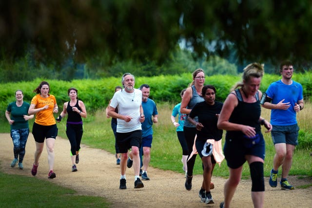 Runners taking part in parkrun at Bushy Park in south-west London in 2021