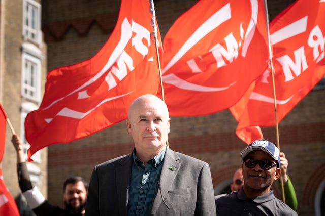 The RMT general secretary, Mick Lynch, on a picket line outside St Pancras station in London