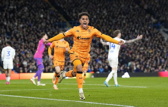 Fabio Carvalho spreads his arms wide in celebration after scoring for Hull