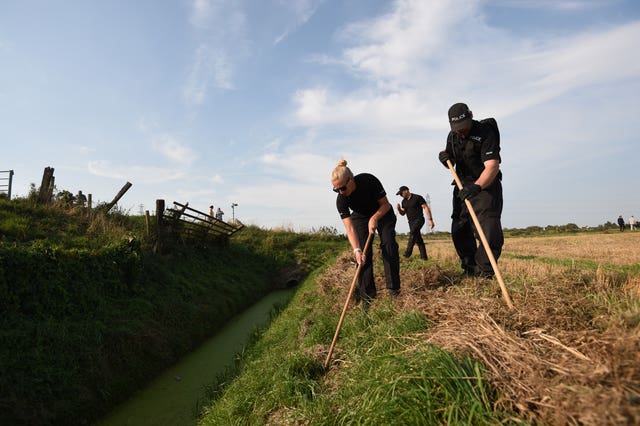 Police search a site in Cowbit, Lincolnshire