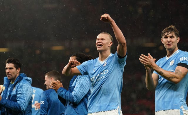 Erling Haaland leads the celebrates after Manchester City's 3-0 victory at Old Trafford earlier this season 