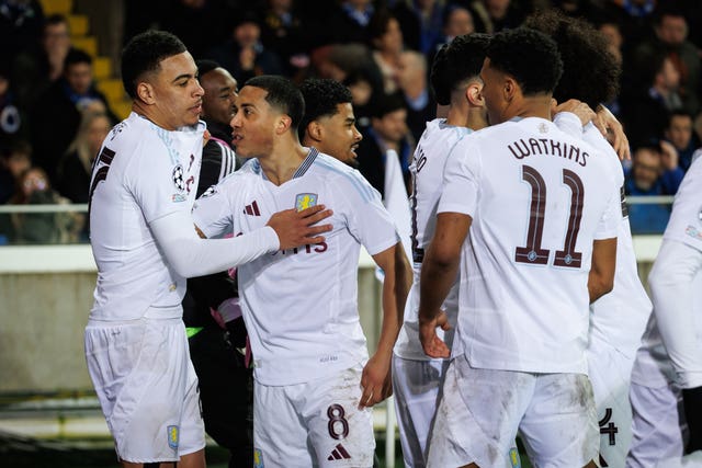 Aston Villa players celebrate their second goal