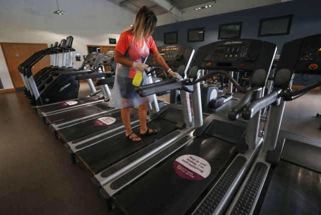 Gym equipment is cleaned prior to reopening