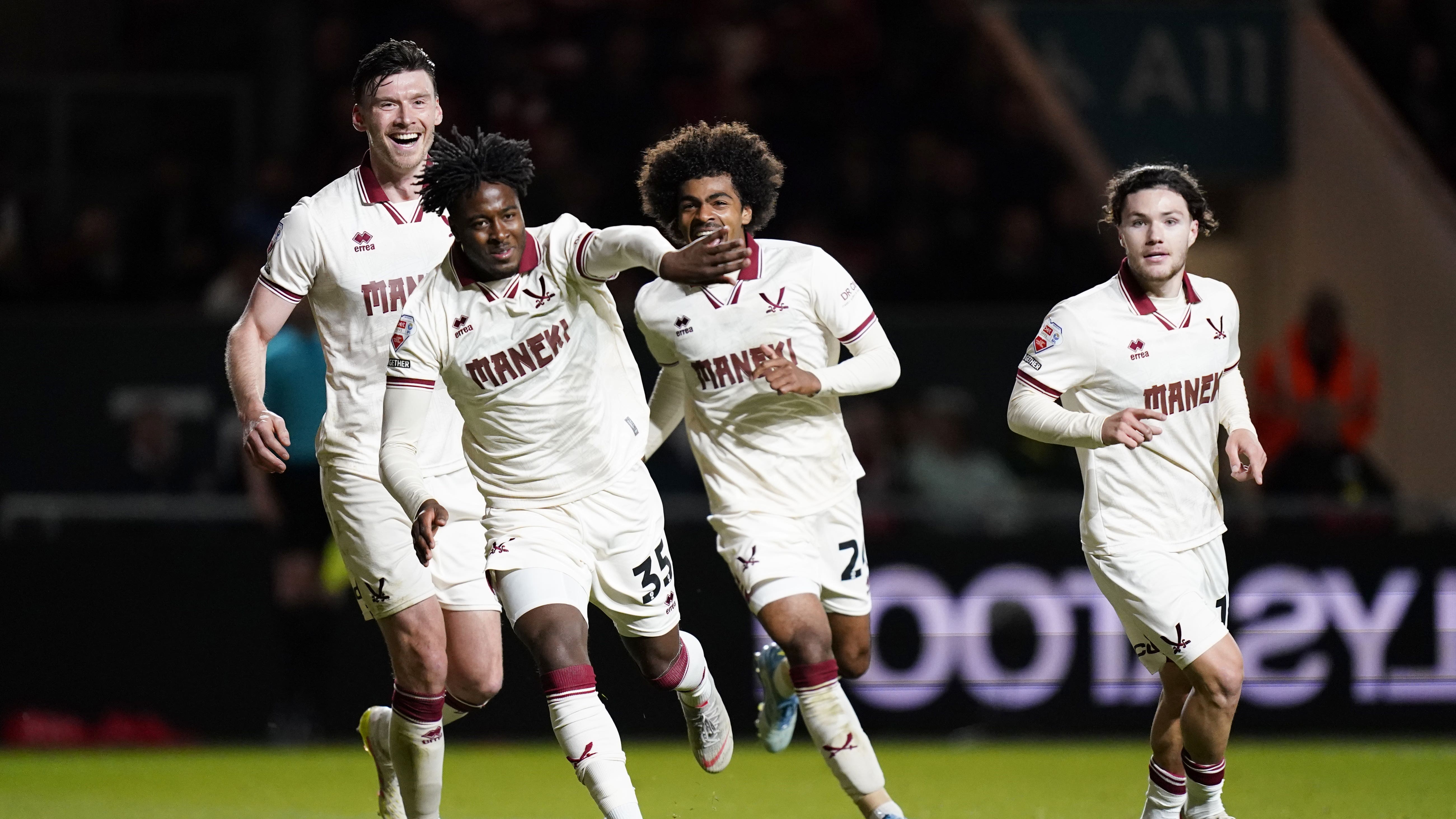 Andre Brooks leads Sheffield United’s play-off celebrations after scoring in their 3-0 semi-final first leg win at Bristol City (Andrew Matthews/PA)