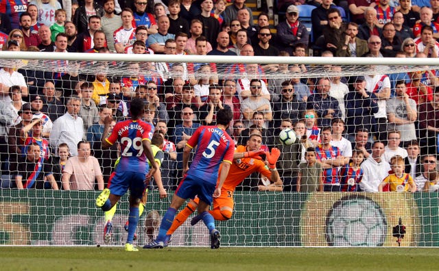 Vicente Guaita, right, saves from Chris Lowe