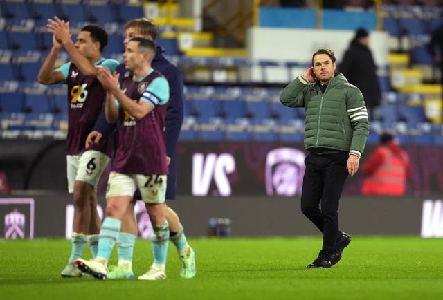 Burnley manager Scott Parker and players acknowledge the crowd after victory over Oxford