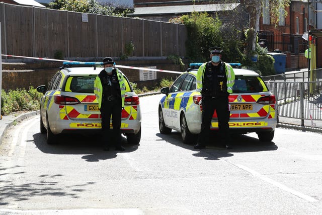 Police officers at a cordon in Walton-on-Thames 