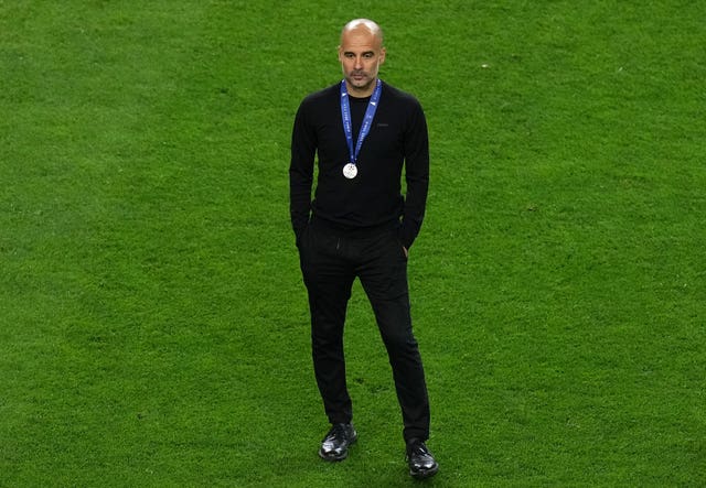 Guardiola looked on as Chelsea celebrated their success 