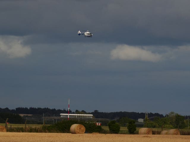A Garda helicopter above Casement Aerodrome 