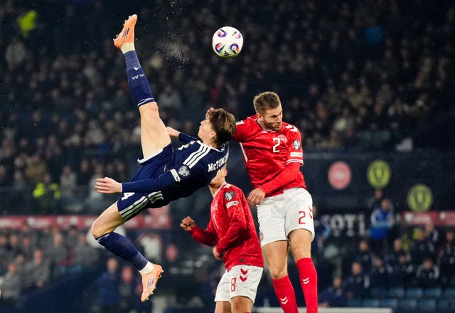 Scotland’s Scott McTominay scores the opening goal during the win over Denmark