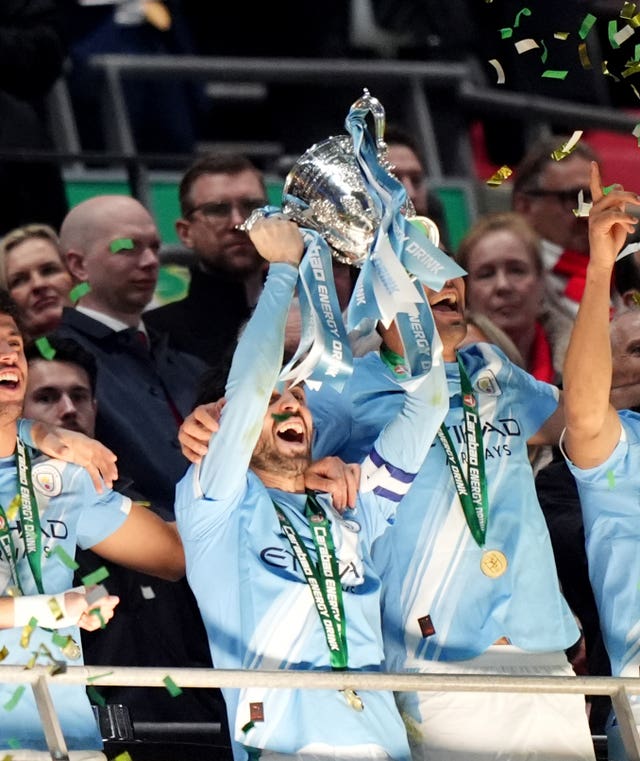 Manchester City&rsquo;s Bernardo Silva lifts the trophy after winning the 2026 Carabao Cup final against Arsenal at Wembley