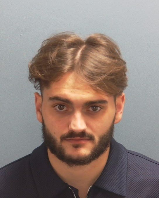 Handout mugshot of Taylor Grundy  