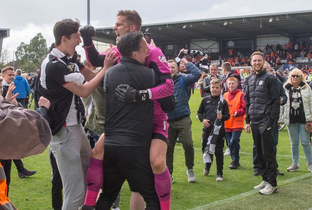 Vaclav Hladky celebrates with St Mirren fans after the Premiership play-off final second leg