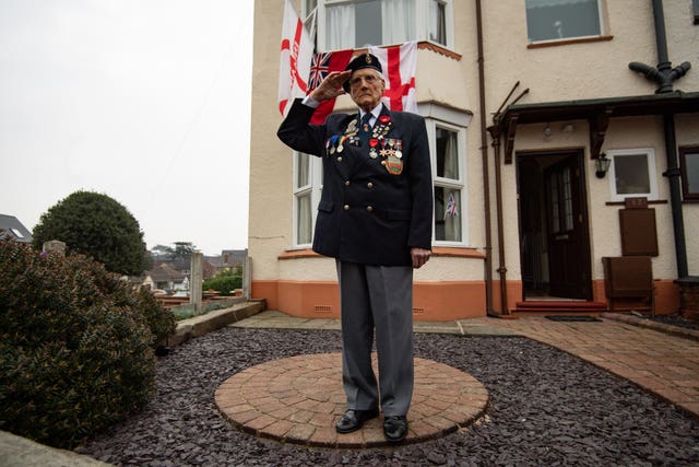 Merchant Navy veteran Bill Bennett, 94, wears his medals whilst at his home in Kidderminster, during the two-minute silence 