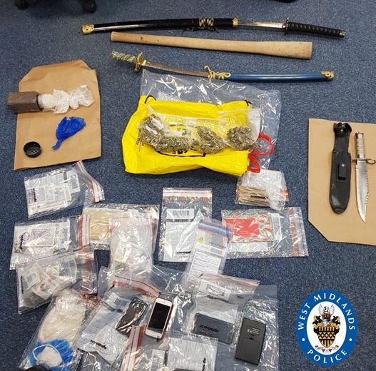 Drugs and weapons seized during one county lines crackdown by West Midlands Police.