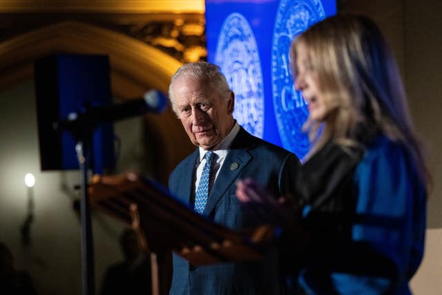 Charles listens on as SMI chief executive Jennifer Jordan-Saifi speaks at the Sustainable Markets Initiative Terra Carta Exhibition