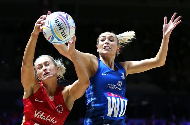 England’s Chelsea Pitman (left) and Scotland’s Sarah MacPhail battle for the ball during England's win in their Netball World Cup match at the M&S Bank Arena in Liverpool