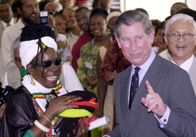 Charles when he was the Prince of Wales with Bob Marley’s widow Rita