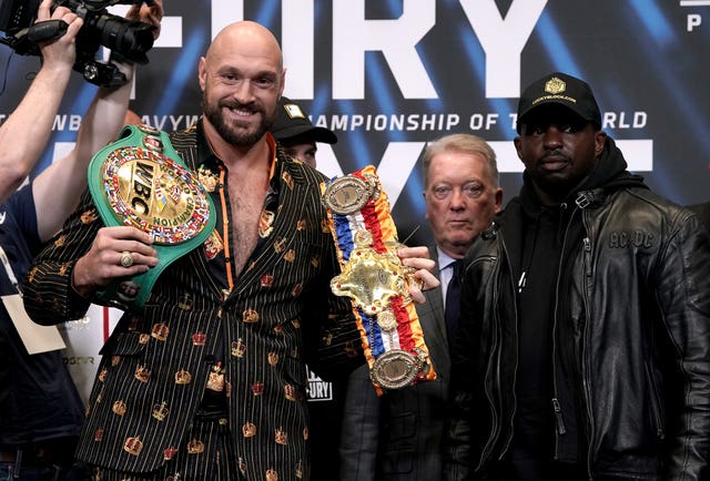 Tyson Fury, left, defends his WBC heavyweight title against Dillian Whyte this weekend (Nick Potts/PA)