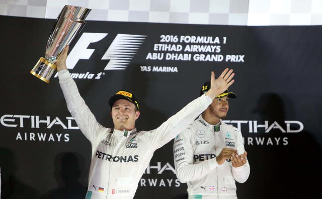Nico Rosberg, left, celebrates winning the Formula One World Championship in 2016