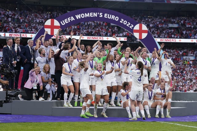 England celebrate with the trophy following victory over Germany in the Women’s Euro 2022 final 