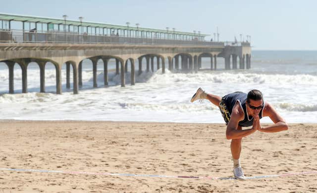 Others stayed in the sand (Andrew Matthews/PA) 