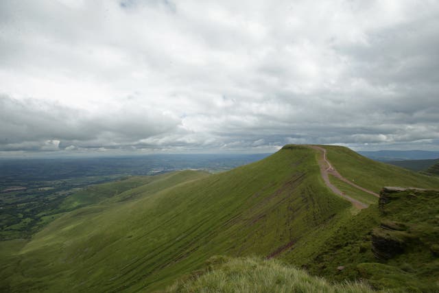 A view of the summit of Pen y Fan mountain from Corn Du, in Brecon Beacons National Park, Wales (Yui Mok/PA)