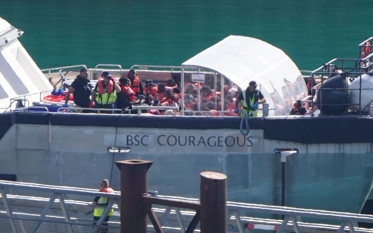 UK borders are secure, minister says after migrant boat reaches coast ...