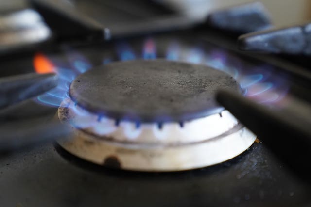 File photo dated 26/08/22 of a gas hob burning on a stove