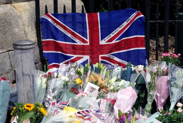 Flowers are laid outside of Windsor Castle, Berkshire
