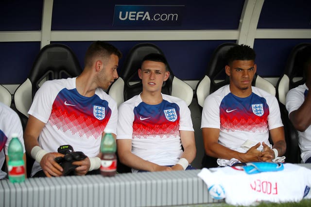 Phil Foden, centre, on the England bench