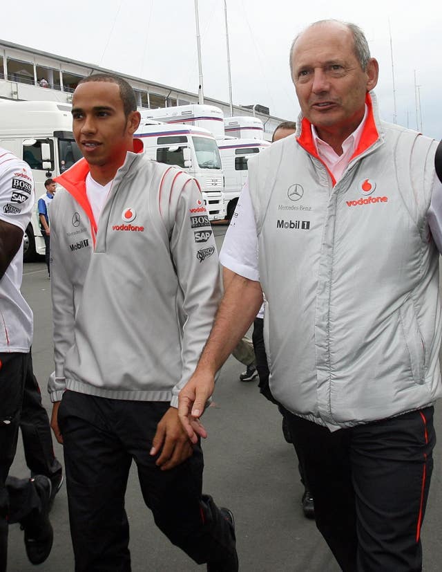 Dennis (right) was a key figure in the early career of Lewis Hamilton (left)