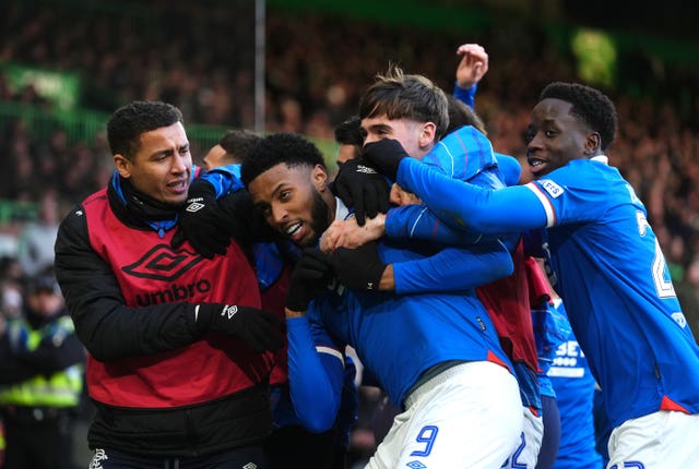 Youssef Chermiti, centre left, celebrates with team-mates after scoring Rangers’ second goal against Celtic