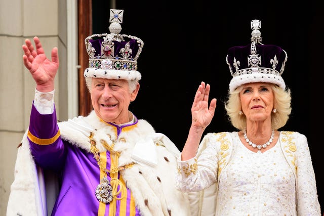 The King and Queen on the balcony of Buckingham Palace following their coronation