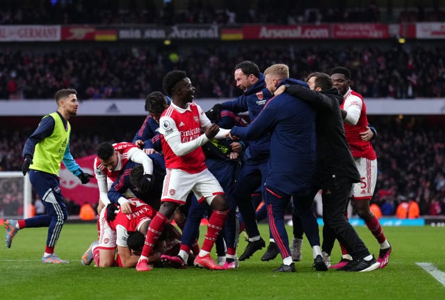 Arsenal celebrate their last-gasp win