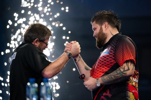 Smith (right) eased into the final by beating James Wade 