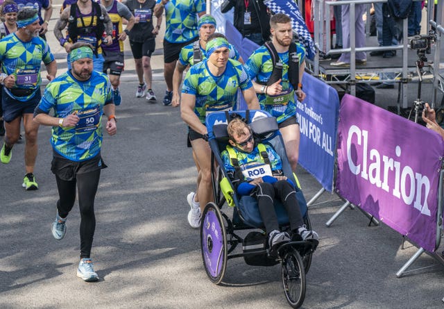 Sinfield pushed his friend Rob Burrow around the Leeds marathon