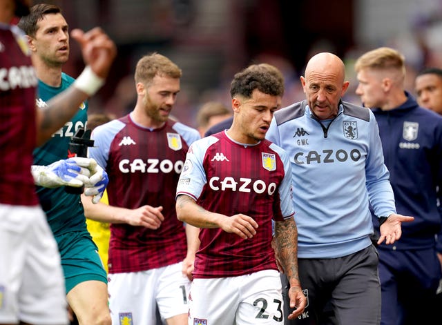 Aston Villa’s Philippe Coutinho speaks to assistant head coach Gary McAllister during the Premier League match at Villa Park, Birmingham. Picture date: Saturday April 30, 2022