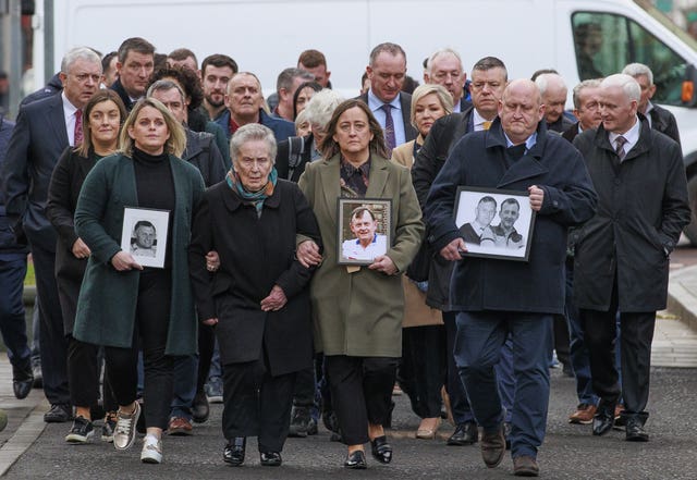 The family of murdered GAA official Sean Brown walk to Belfast High Court 