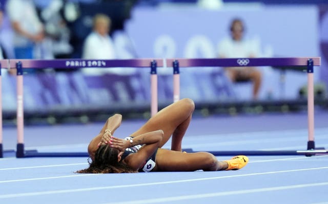 Great Britain’s Lina Nielsen lies on the track after falling in the women’s 400m hurdles semi-final