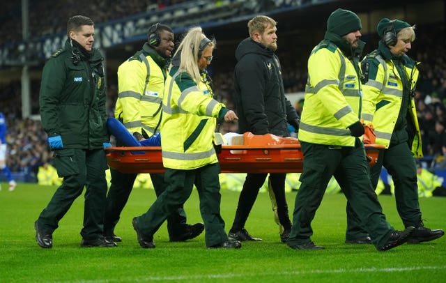 Everton’s Armando Broja leaves the game on a stretcher