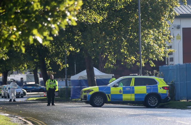 The scene outside Ascot Drive police station in Derby where a man was taken to hospital after being shot by armed officers