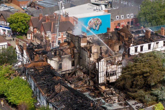 An aerial view of the burned Raven Hotel