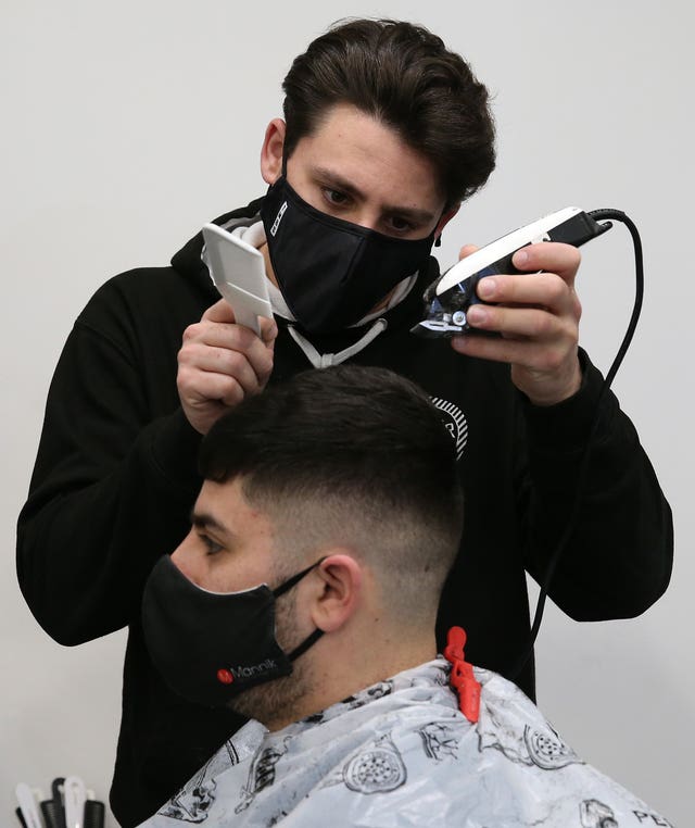 Barber with customer