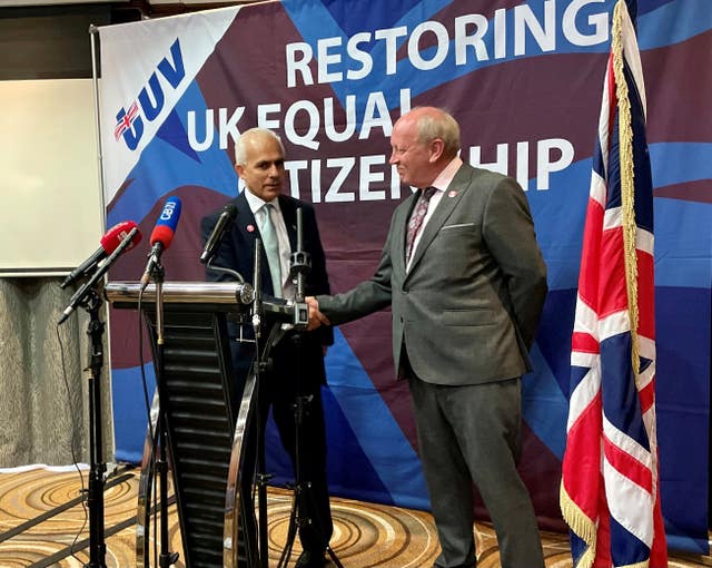 Reform UK deputy leader Ben Habib and TUV leader Jim Allister shake hands 