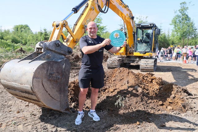 Rory Best turning the first earth on the site of Cancer Fund for Children’s new Daisy Lodge in Cong in Co Mayo